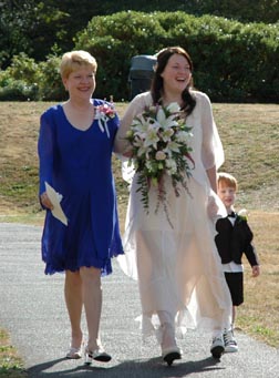 Bride escorted by Mother & Son